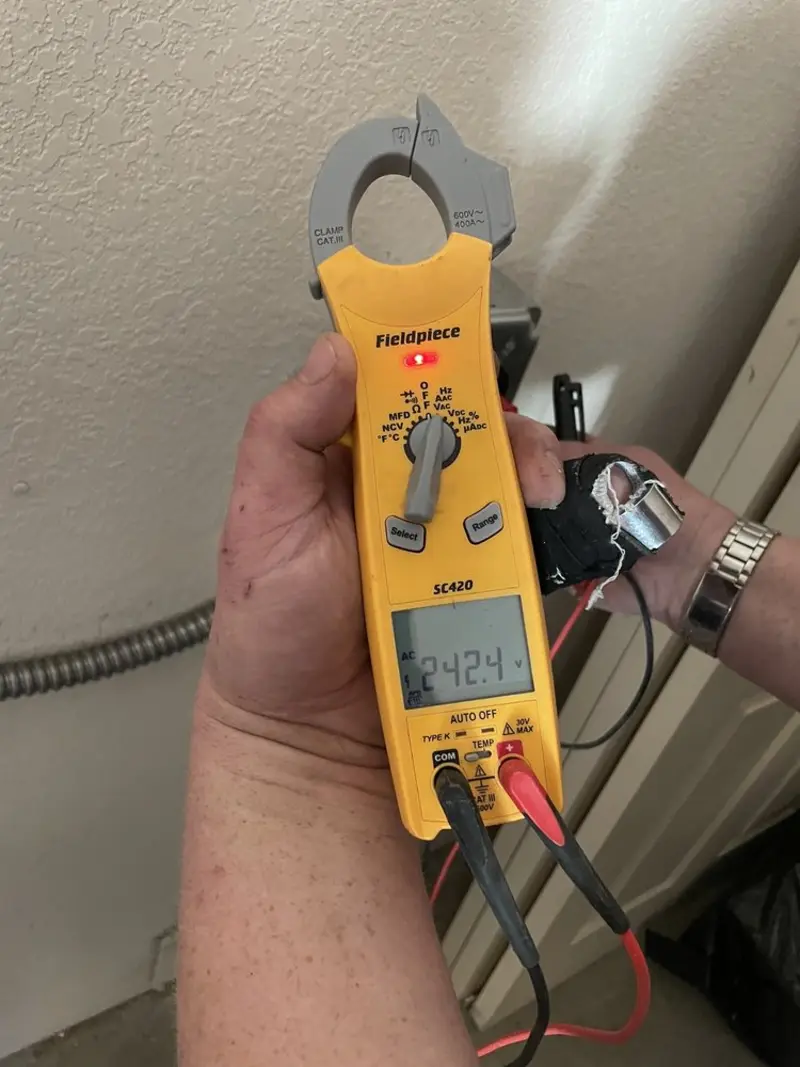 Voltage testing with clamp meter during Electrical Installation Services in Goldendale